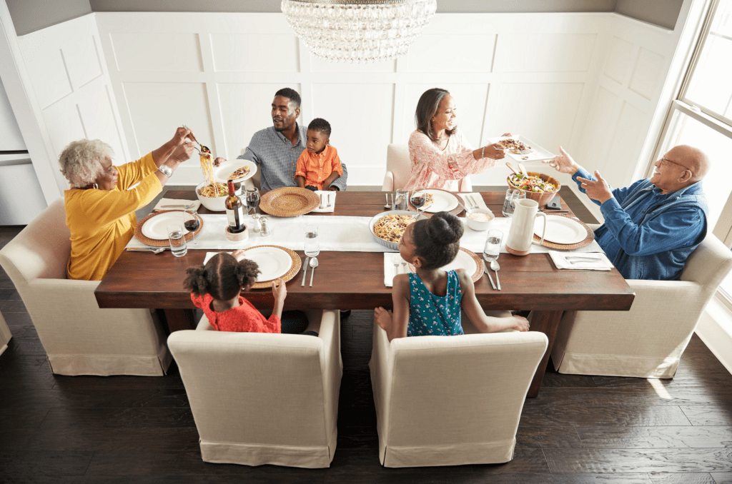 Happy family enjoining breakfast | America's Flooring Store
